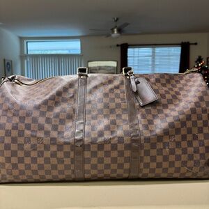 Luis Vuitton Damien duffle